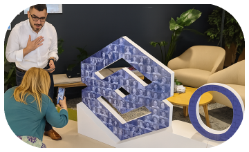 3D selfie sculpture mosaic display at a corporate event in Dubai with guest photos forming a 360-degree interactive art installation